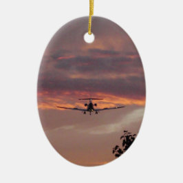 Reklamfilmjetlandning på solnedgången julgransprydnad keramik