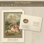 Religiösa jul Jesus Virgin Mary St Joseph Helgkort<br><div class="desc">Det här vackra julkortet har en vacker personlig av den traditionella katolska religiösans vintage som heter Virgin Mary,  St. Joseph och änglar och som ser på Kristus barn när han ljuger i manern. All text och typsnitt kan ändras.</div>