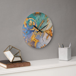 reloj abstracto con tonos azules y oro stor klocka