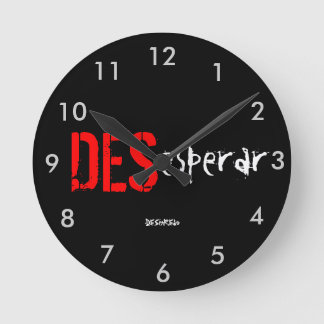Reloj de pared DESesperar DESenREdo negro Rund Klocka