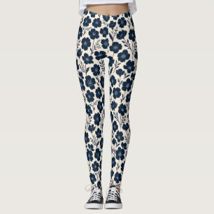 Rena monokroma vildblommor i marinblått på krämfär leggings