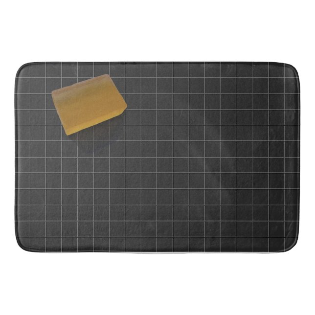 Rensa Orange-soap på en svart platta Golv Badrumsmatta (Framsidan)