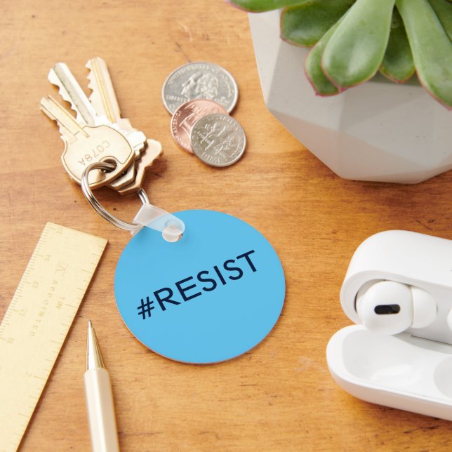 #Resist, svart text i den blå nyckelkedjan himlar Nyckelring (Skrivbord)