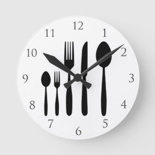 Restaurangväggen tar tid på med numrerar rund klocka