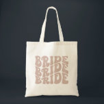 retro bride tote bachelorette tote bride rosa tygkasse<br><div class="desc">Den här reläväskan har ett typsnitt för funkyn med en grooval layout. Redigera all färg för att göra så att den här väskan helt passar din händelse   personlig stil!</div>