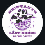 Retro Disco Cowgirl Bachelorette Party Runt Klistermärke<br><div class="desc">Flickans lila glitter disco boll och ett mycket retro cowgirl-team-team från mönster för att skapa perfekt disco cowgirl party-dekalen. Det här objektet är en del av insamlingen av Lila Glitter och Cow Mönster,  där du hittar en mängd bachelorette Party-papper och party.</div>