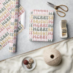 Retro Groovy Merry & Bright Colorful Mönster Presentpapper<br><div class="desc">Bygg ut retro-diagrammet med den här Groovy Merry & Bright Helgdag-designade pappra designen. Med typsnitt i rött,  grönt,  guld och rosa färger som lyder "Merry" "Bright" och skapar ett färglöst festligt mönster som säkert lägger till en kopp färg i dina gåvor den här julhelgen.</div>