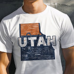 Retro Travel Iconic Utah Graphic T Shirt<br><div class="desc">Fira Beehive-staten med denna Retro Travel Iconic Utah Graphic T-Shirt. Den här skjortan är en vintage-inspirerad design som fångar Utahs fantastiska landskap och unika charm. Den är perfekt för både resenärer och boende. Den är tillverkad av högkvalitativa material för bekvämt bruk och passar perfekt för avslappnader, resor och vardaglig bära....</div>