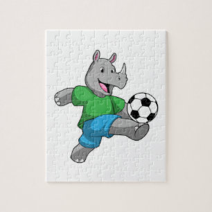 Rhino som fotbollsspelare med fotboll pussel
