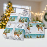 Rhodesian Ridgeback Lejon Hund Snowy Winter Forest Presentpapper<br><div class="desc">Desteis ursprungliga tecknad illustration av en söt Rhodesian Ridgeback-hund. Hund placeras på en vinterscen med tre gröntar för träd. Bakgrunden är en blå till vit övertoning som ge kallets vintag. Det finns ett anpassningsbara textområde som nu lyder: "God jul!" tillsammans med ett eget namn.</div>