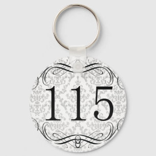 Riktnummer 115 nyckelring