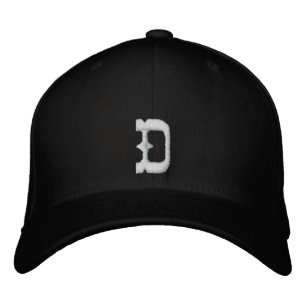 Ritningen "D" som Broderad Keps