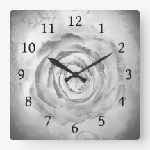 Ro, blomning 13, svart och vit ruta, väggklocka