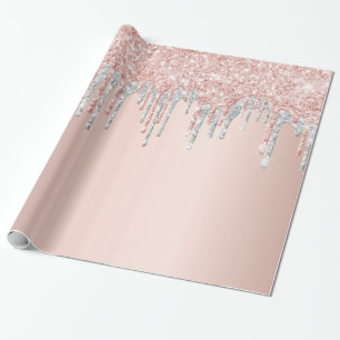 Ro guld glitter droppar i silver på födelsedagen presentpapper