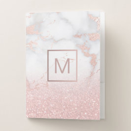 ro guld monogram på marmor för rosa