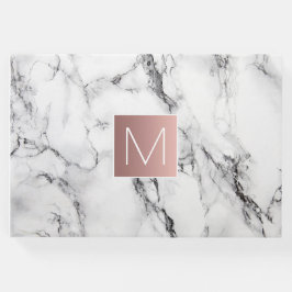 ro guld monogram på vitt marmor gästböcker