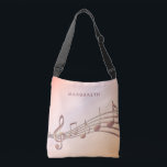 Ro guld musik noter-musiker namn axelväska<br><div class="desc">Enkel och elegant för musiken älskare eller musiker! Övertoningsbakgrund för ro guld med musik noter i färgaden ro guld. Mall för ditt namn,  handskript för stil.</div>