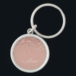 Ro Guld  Rosa Glitter Script Monogram Girly Rund Silverfärgad Nyckelring<br><div class="desc">Ro Guld -  Rosa Gnistra Glitter Skriptmonogram Namn nyckelringar (Nyckelring). Det gör perfekten söt 16-årsjubileum,  bröllop,  möhippa,  årsdag,  babydusch eller bachelorette-fest för någon som glam lyxen och chic stilar i kärlek.</div>