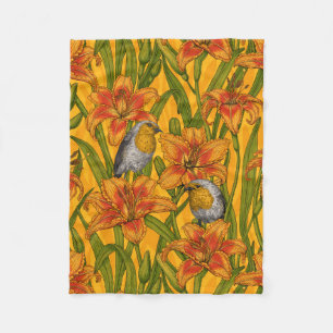 Robiner och liljeblommor, orange och grönt fleecefilt