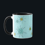 Robin's Egg Blue Atomic Starbursts Mugg<br><div class="desc">Denna Robin's Egg Blue Iconic Atomic Starbursts från Mugg mönster har ikoniska atomstjärnor. Det är höger! Bakgrunden till den blåa färgaden i old school med guld-späckar är perfektens bakgrund för den pulserande turkosen, kökssleriet och färgaden för päronpäron i grönten. Sportarna i färg placeras sporadiskt i olika storlekar med överliggande V-formad...</div>