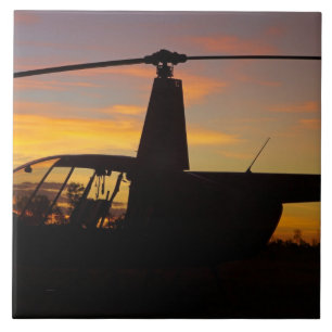 Robinson R44 helikopter vid solnedgång Kakelplatta