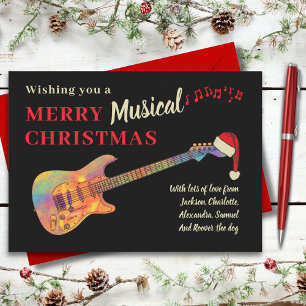 Rock and roll-julGuitar Wearing a Santa Hat Julkort