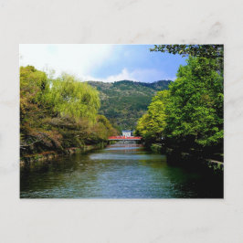 Röd bro över en kanal i Kyoto Vykort