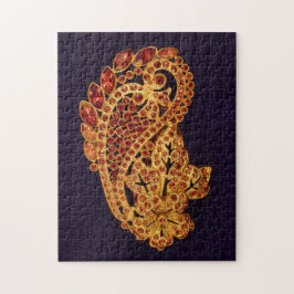 Röd brosch som lugnar det utmana pussel