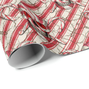 Röd candy canesockerskalle som slår in papper presentpapper