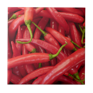 Röd Chilipepparmat belägger med tegel Kakelplatta