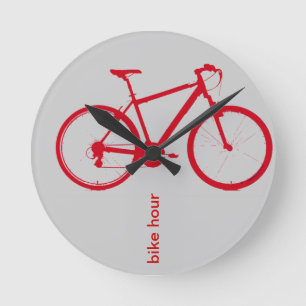 röd cykel som cyklar rund klocka