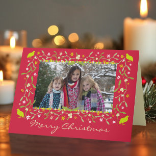 Röd familjefokristmas mistletostjärna helgkort