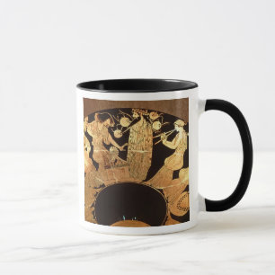 Röd figurkylix för loft som visar Dionysus och Mugg