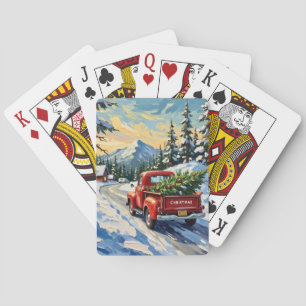Röd gammal lastbil som transporterar julgran casinokort