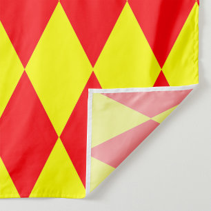 Röd gul harlekinrutig design tyg
