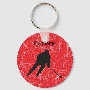 Röd ishockeyspelare nyckelring