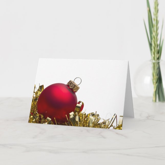Röd jul bauble och guldglitter på vit helgkort (Framsida)