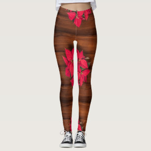 Röd julblomma på brunt leggings