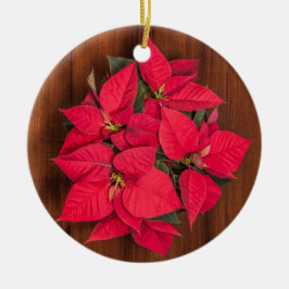 Röd julblomma på brunt trä julgransprydnad keramik