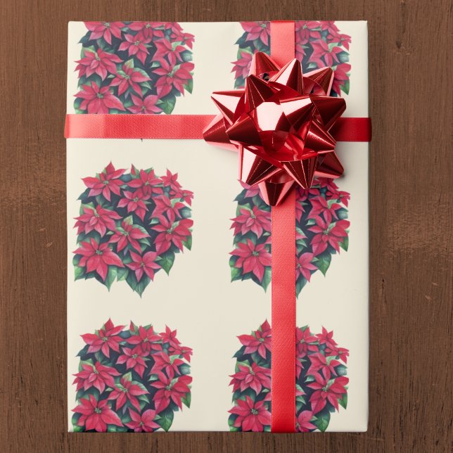 Röd julstjärna julblomma på ljust gult presentpapper (Skapare uppladdad)