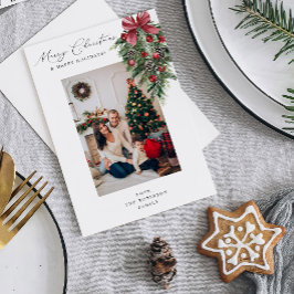 Röd kransprydnad Glad jul V Foto