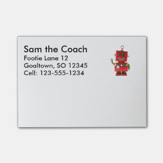 Röd leksakrobot som vinkar hejer post-it block