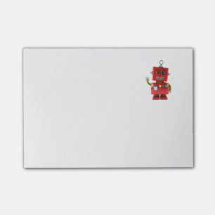 Röd leksakrobot som vinkar hejer post-it block