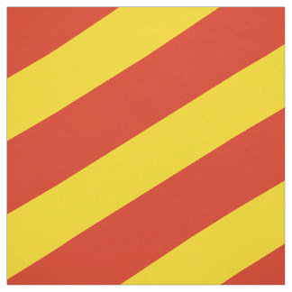Röd och gult strimlad mönster tyg