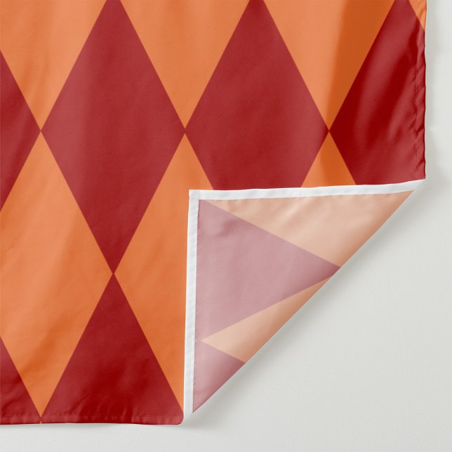 Röd och orange Harlequin-rutig design  Tyg (Skapare uppladdad)