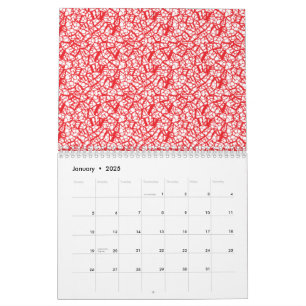 Röd och orange papper med ett geometriskt överkant kalender