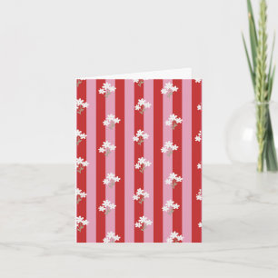 röd och rosa randig design med vita blommor kort