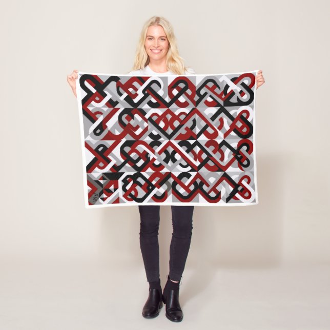 Röd och svart geometrisk mönsterfilt i fleece (På plats)
