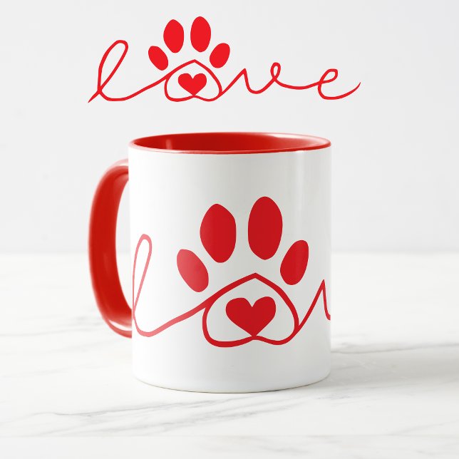 Röd och vit hundkärleksmugg mugg (Dog love with paw print mug in red and white.)
