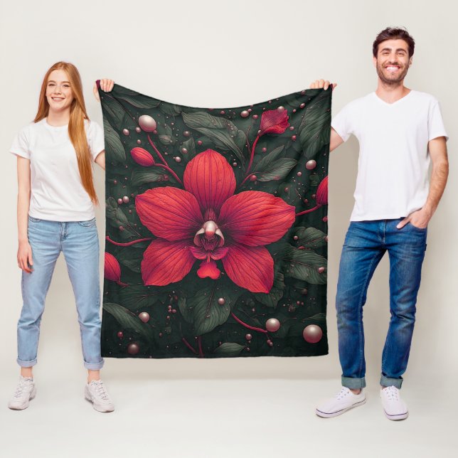 Röd orkidé blommar med gröna blad fleecefilt (På plats)